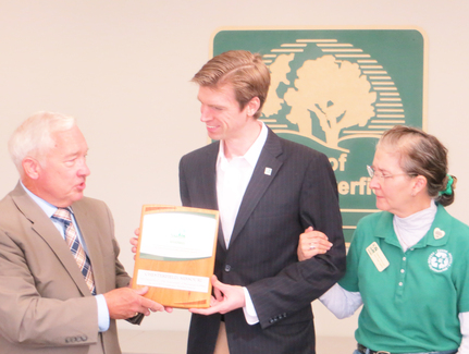 Collin Oâ€™Mara, NWF President and CEO presented Mayor Bob Nation with Community Service Award with 